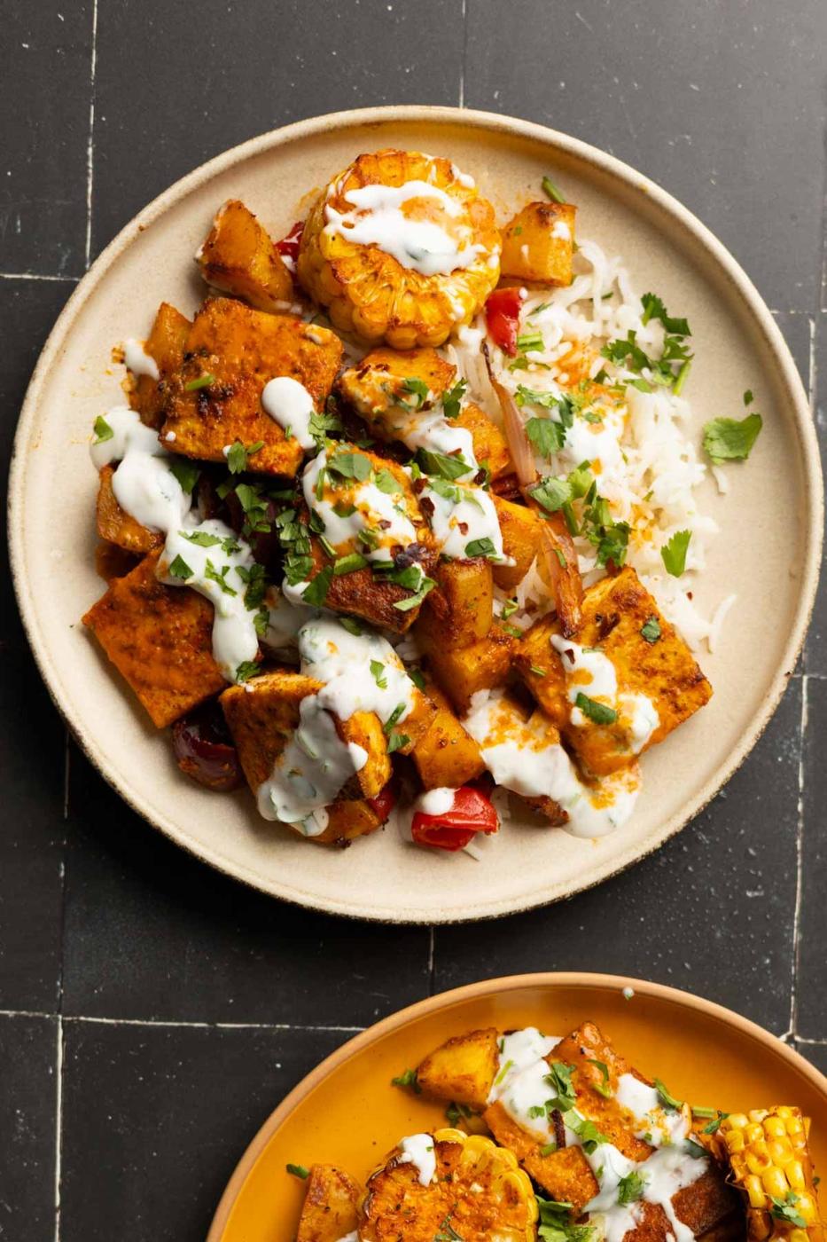 peri-peri tofu and vegetables with rice on a plate