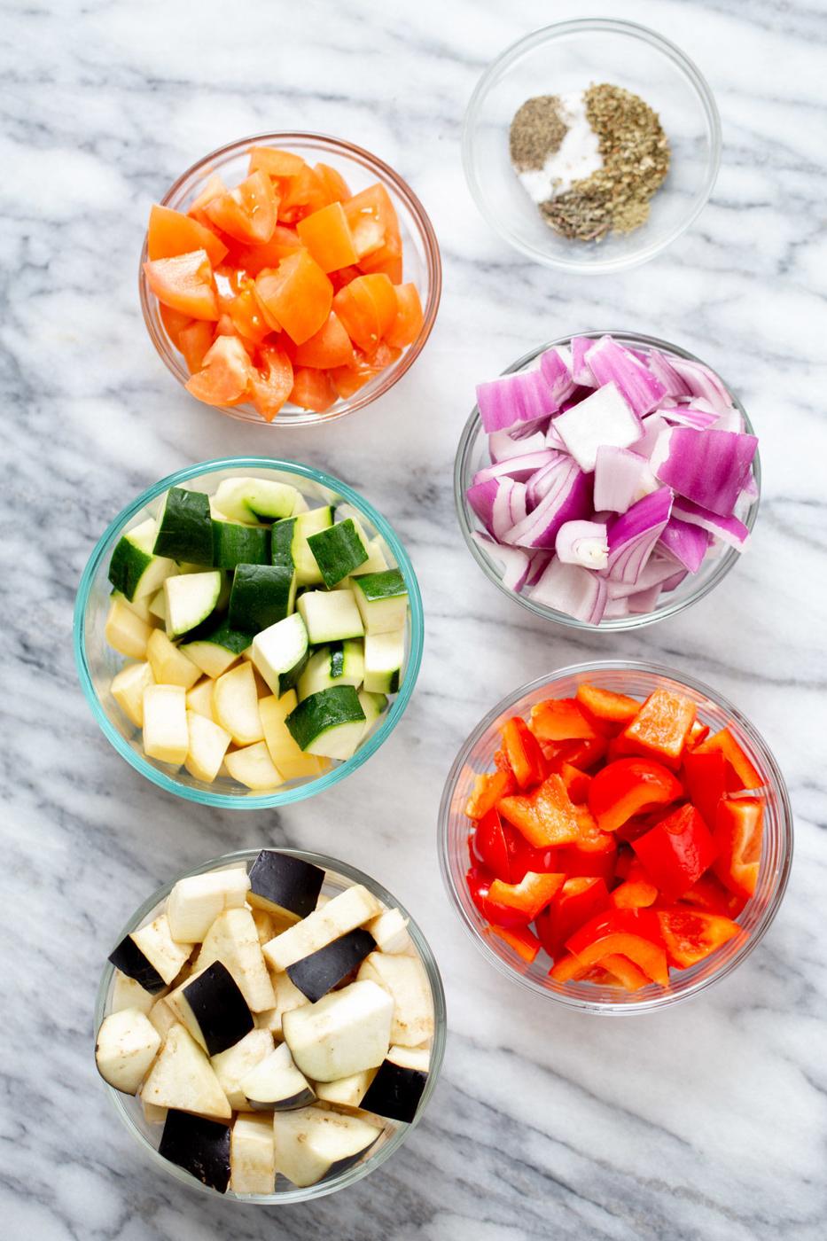ingredients for baked ratatouille in glass bowls