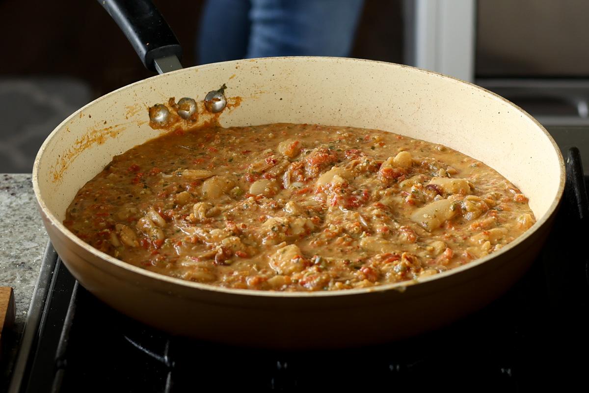 Sicilian pesto sauce butter beans in the pan after cooking