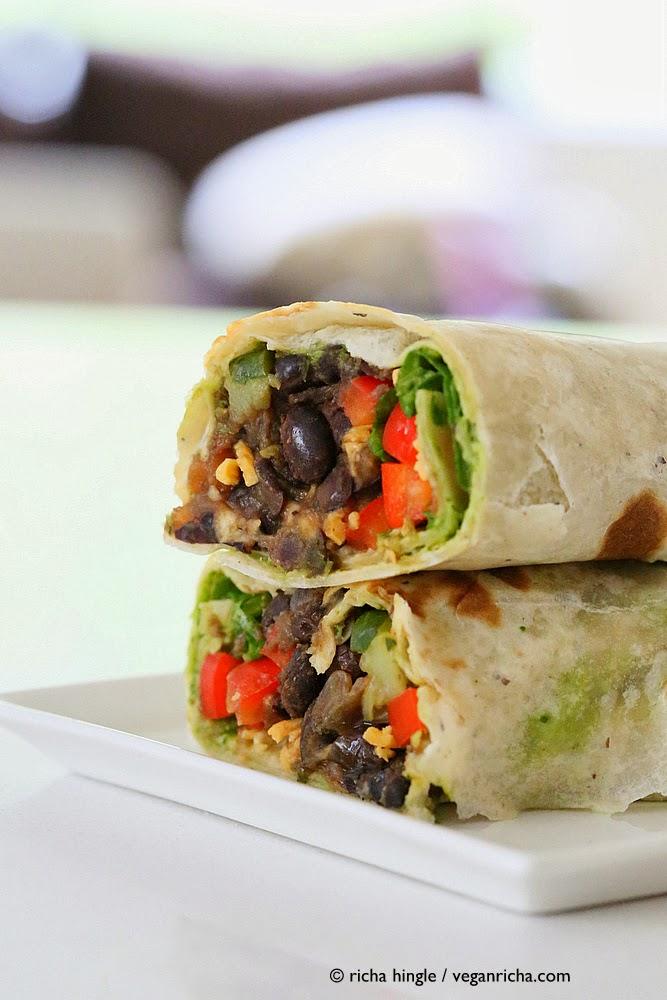 side view of two stacked haves of Vegan Smoky Black Bean Wraps with Parsley Chimichurri