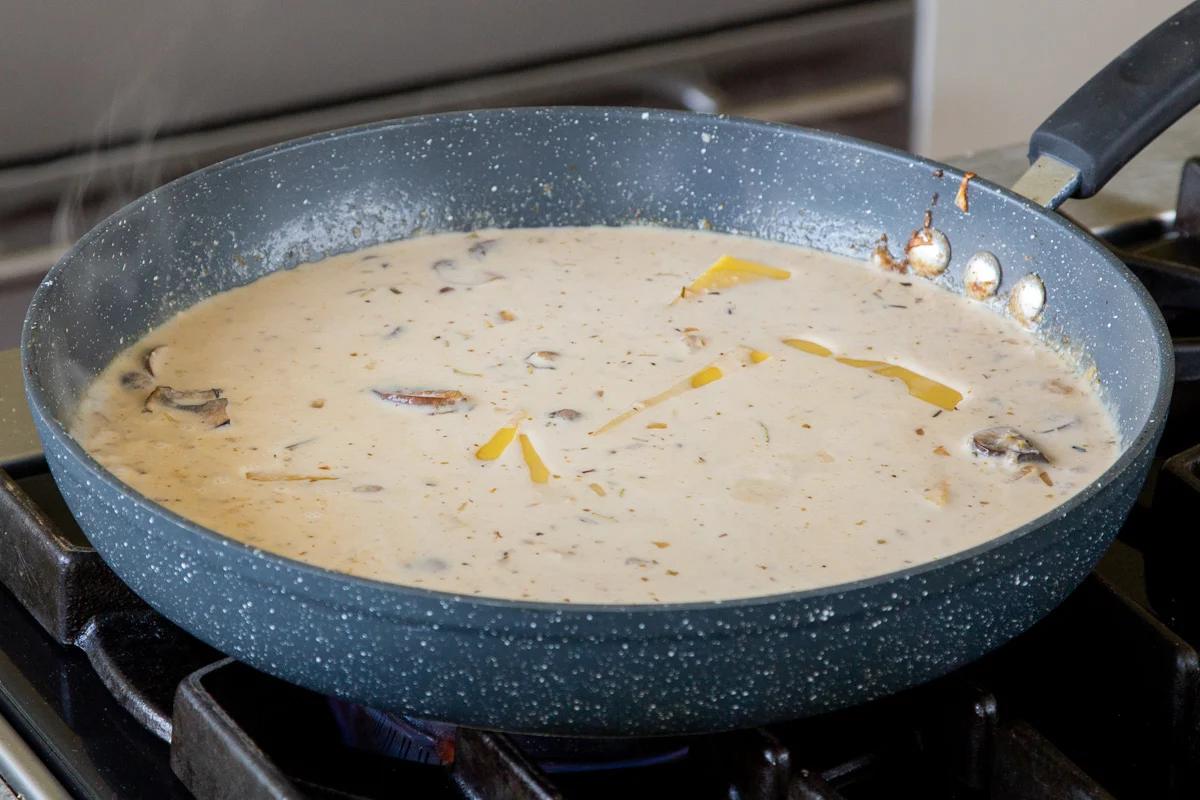 lasagna noodles, submerged in the smoky sauce, before cooking