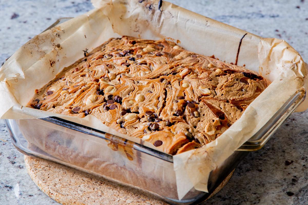Snickers cake with the peanut butter swirled in, after baking