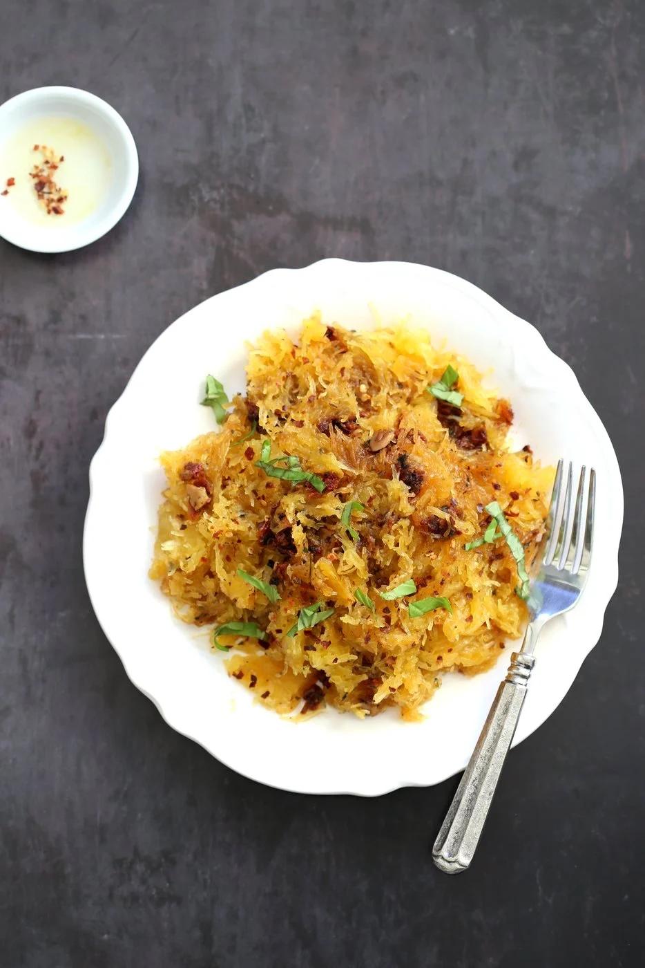 Spaghetti Squash Pasta with Sundried Tomato, Garlic & Basil. Light Dinner with no Grains. Add some spiced chickpeas or baked tofu for variation. #Vegan #Glutenfree Soy-free #Recipe #veganricha | VeganRicha.com