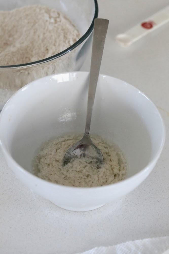 almond milk being mixed with lemon juice and vinegar to make almond milk buttermilk
