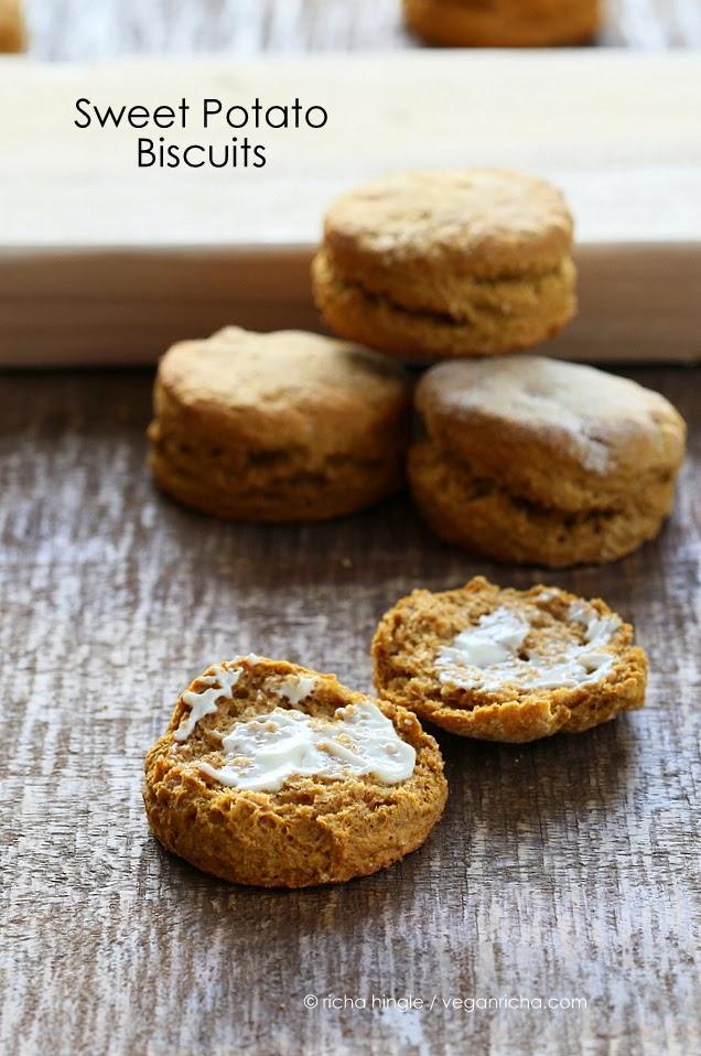 vegan whole wheat sweet potato biscuits split open and topped with butter