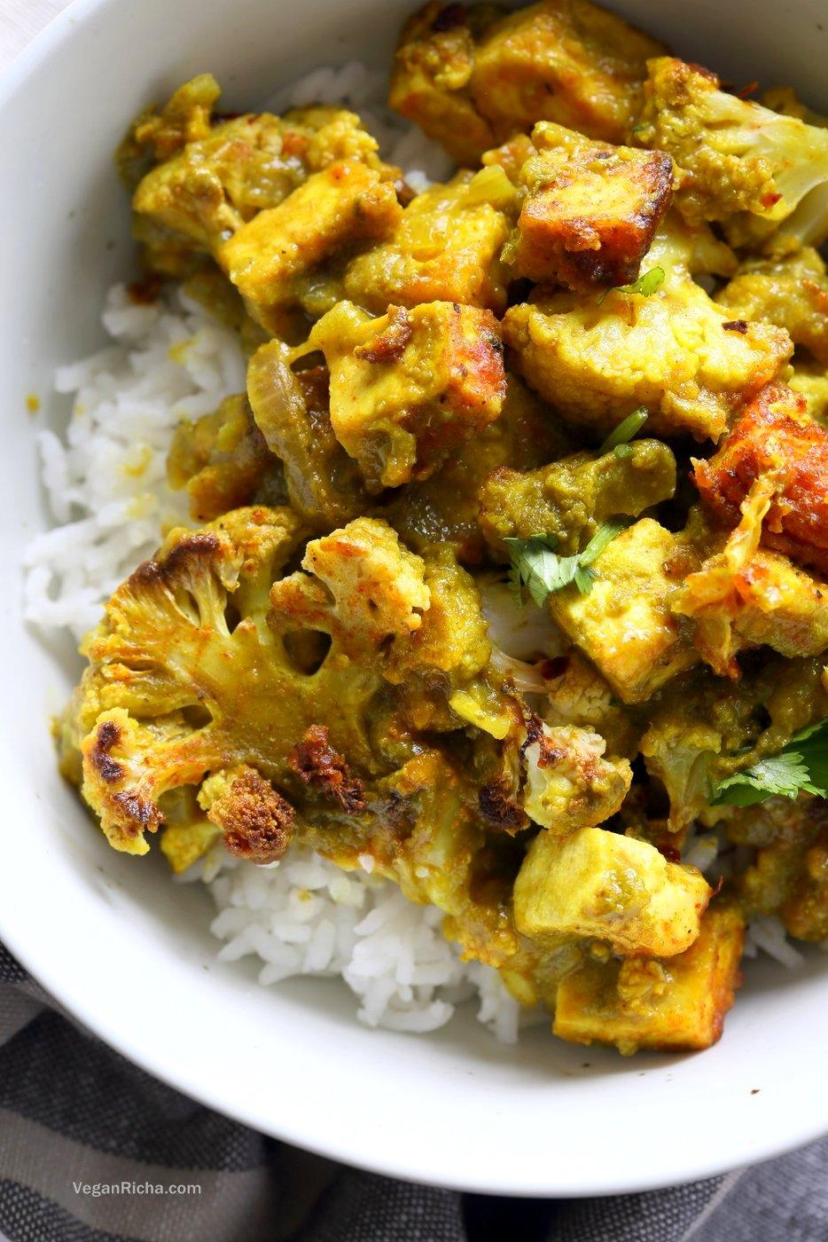 Spiced Cauliflower and Tofu in Green Masala Sauce. Baked Cauliflower and Tofu in green cilantro sauce. The sauce paste can be made ahead and stored. Vegan Gluten-free Nut-free Recipe. Can be soy-free with chickpea tofu or chickpeas or beans or other veggies. | VeganRicha.com