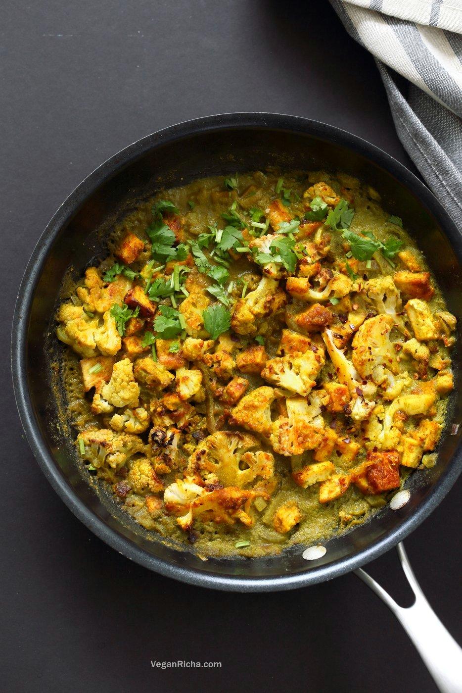 Spiced Cauliflower and Tofu in Green Masala Sauce. Baked Cauliflower and Tofu in green cilantro sauce. The sauce paste can be made ahead and stored. #Vegan #Glutenfree #Nutfree #Recipe #veganricha. Can be soy-free with chickpea tofu or chickpeas or beans or other veggies. | VeganRicha.com