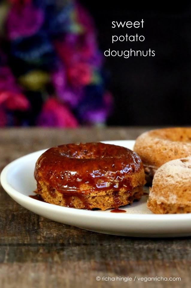 side view of vegan sweet potato donuts with salted caramel glaze on a white plate