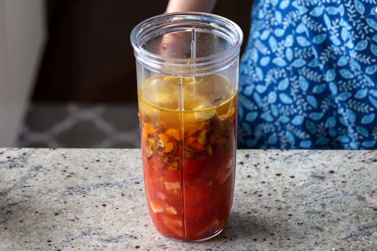 adding water to the food processor