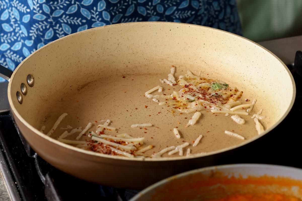 toasting vegan cheese shreds in the pan