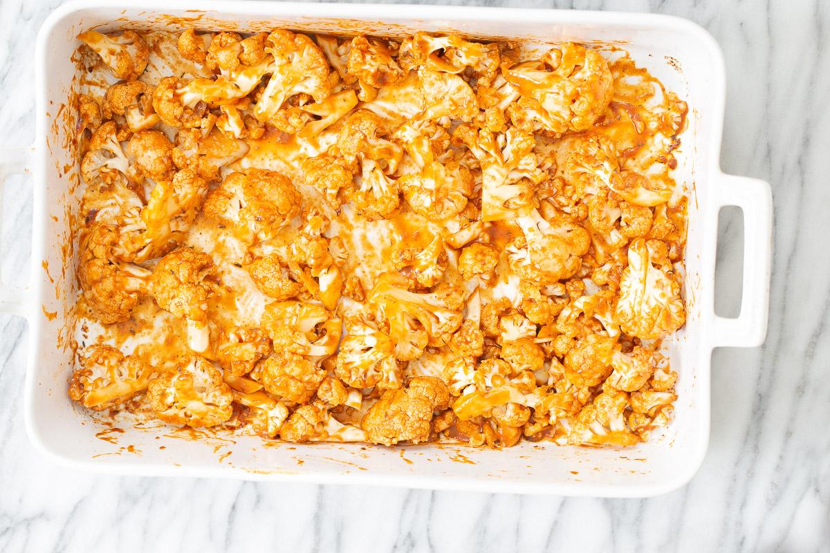 oven roasted bbq spiced cauliflower drizzled with bbq sauce