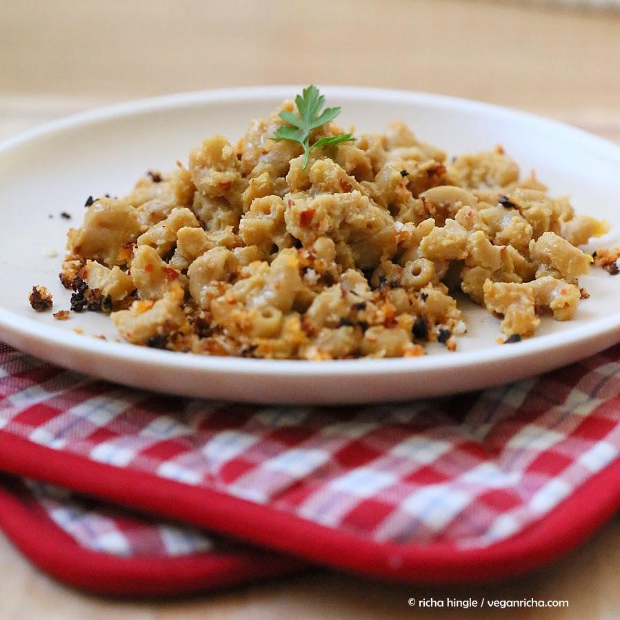 side view of a serving of vegan Spicy Cajun mac and cheese with breadcrumb topping
