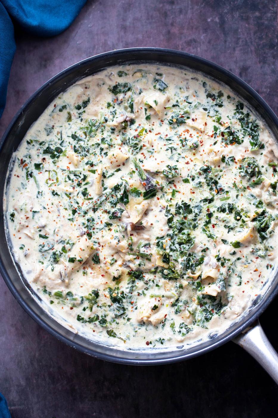 overhad shot of a vegan alfredo skillet lasagna