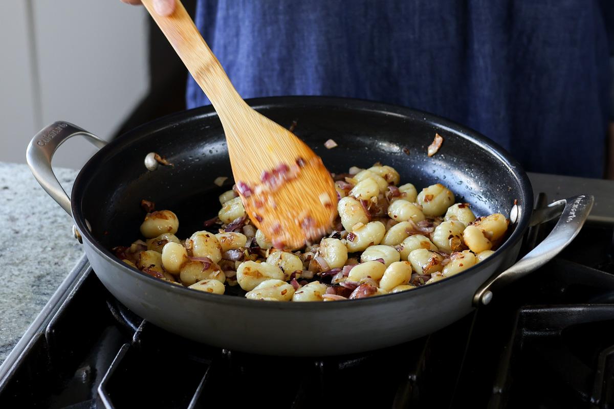 crisped up gnocchi in the pan