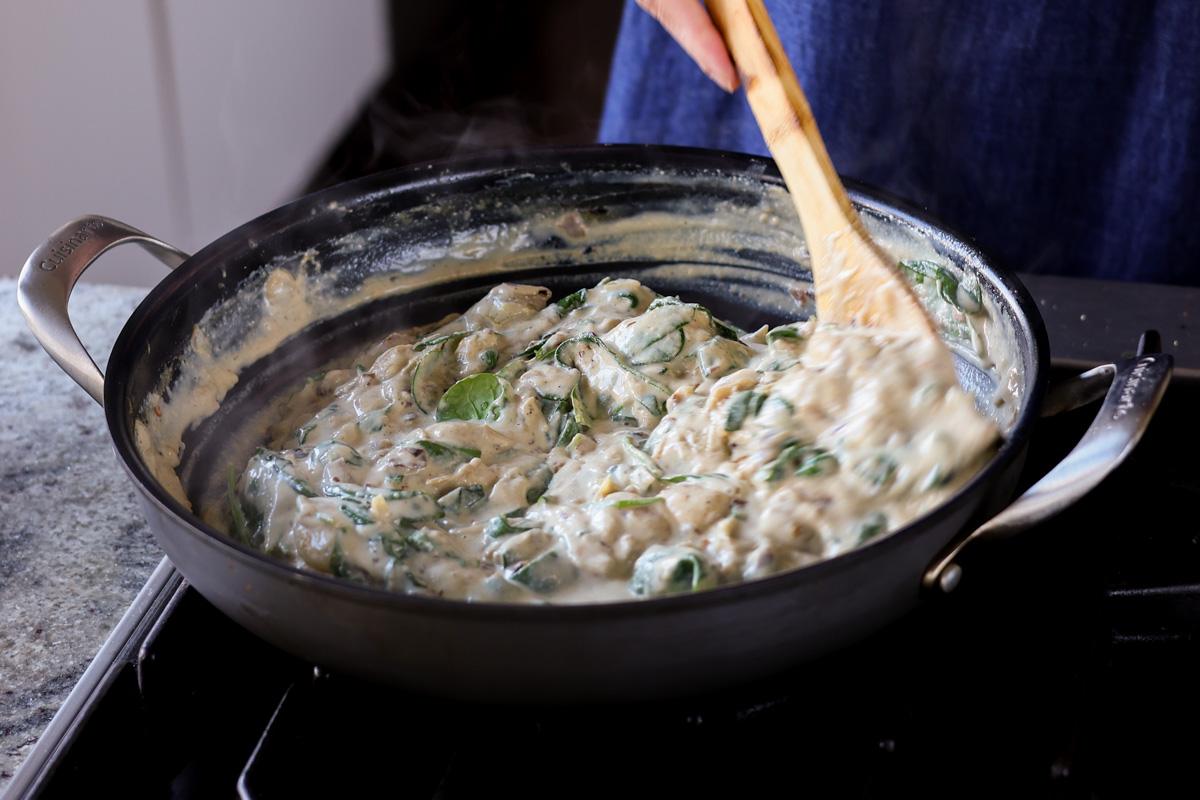 spinach wilted into the cream sauce