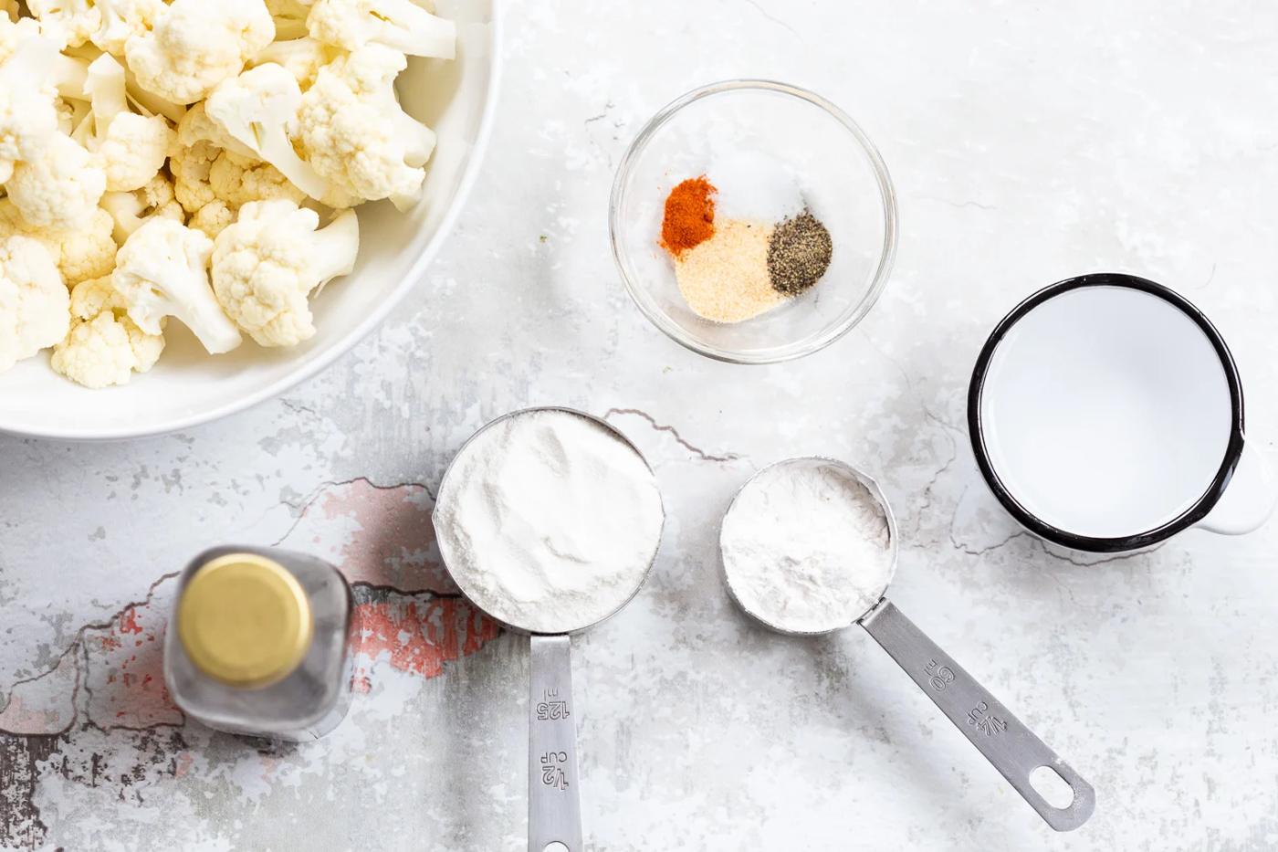 Ingredients in bowls for battered cauliflower for our Sticky Sesame Cauliflower