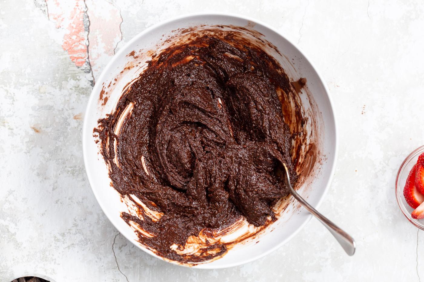 Batter our Vegan Strawberry Brownies in a white bowl