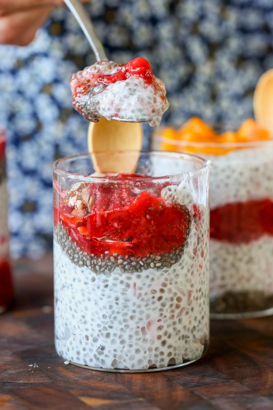 spoon taking a bite of strawberry chia pudding
