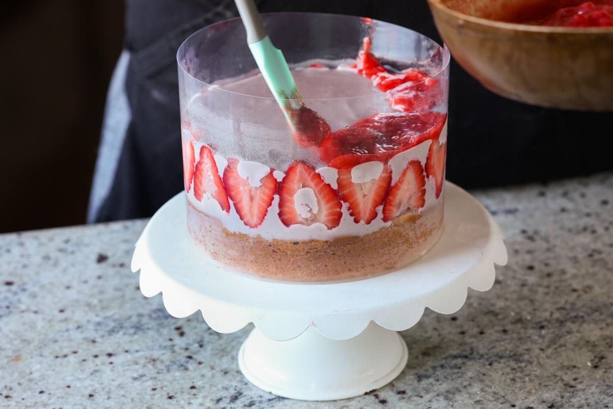 spreading on the strawberry compote