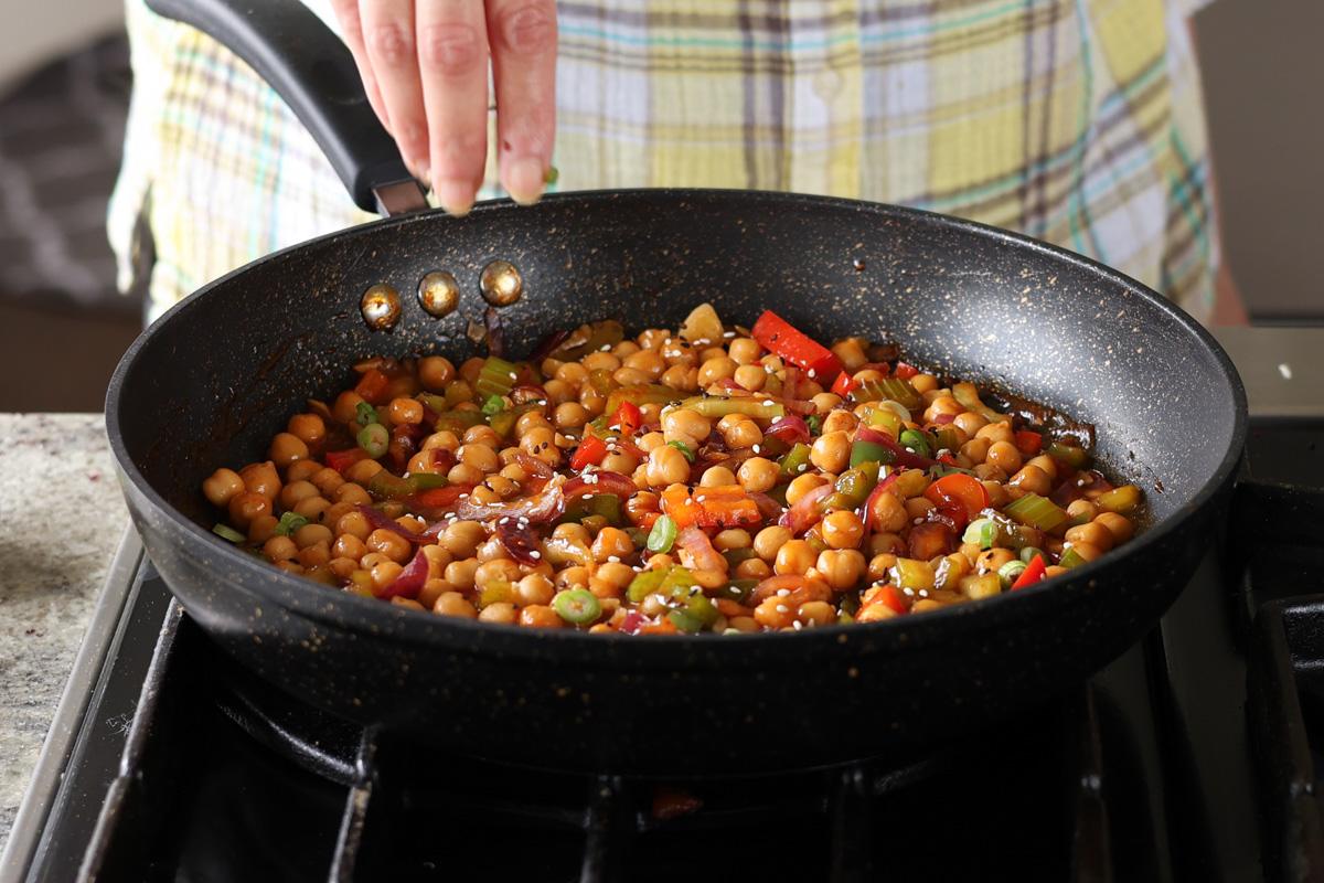 cooking the chickpeas in the gochujang sauce