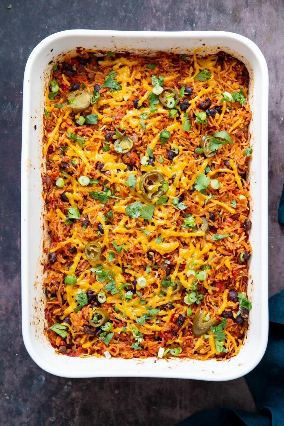 vegan Tex Mex rice casserole sprinkled with cilantro and green onion