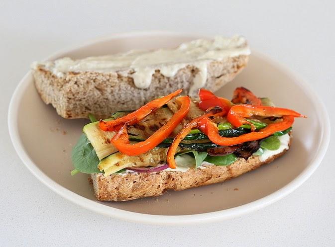 healthy vegan roasted vegetable sandwich being assembled