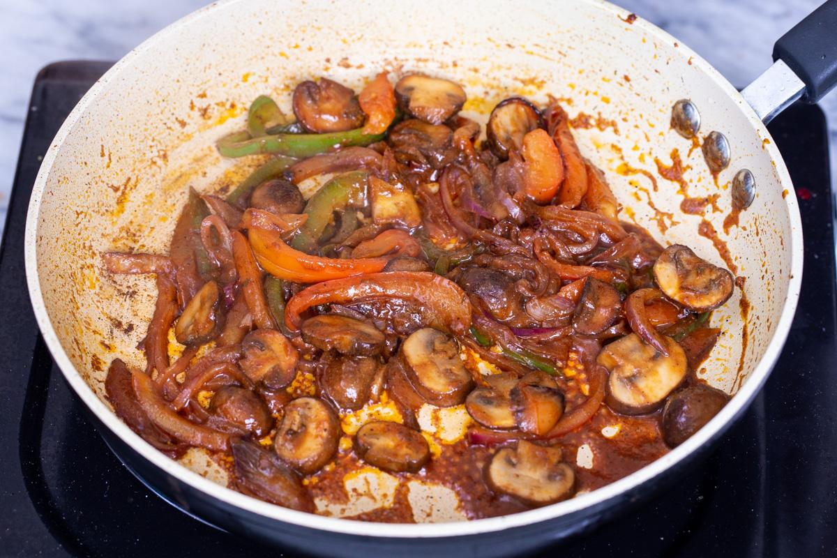 vegan birria tacos filling in a sauteeing pan