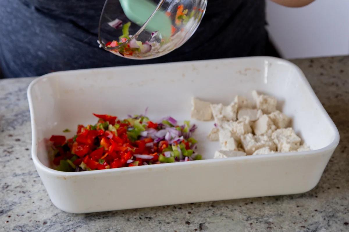 adding aromatics to the baking pan