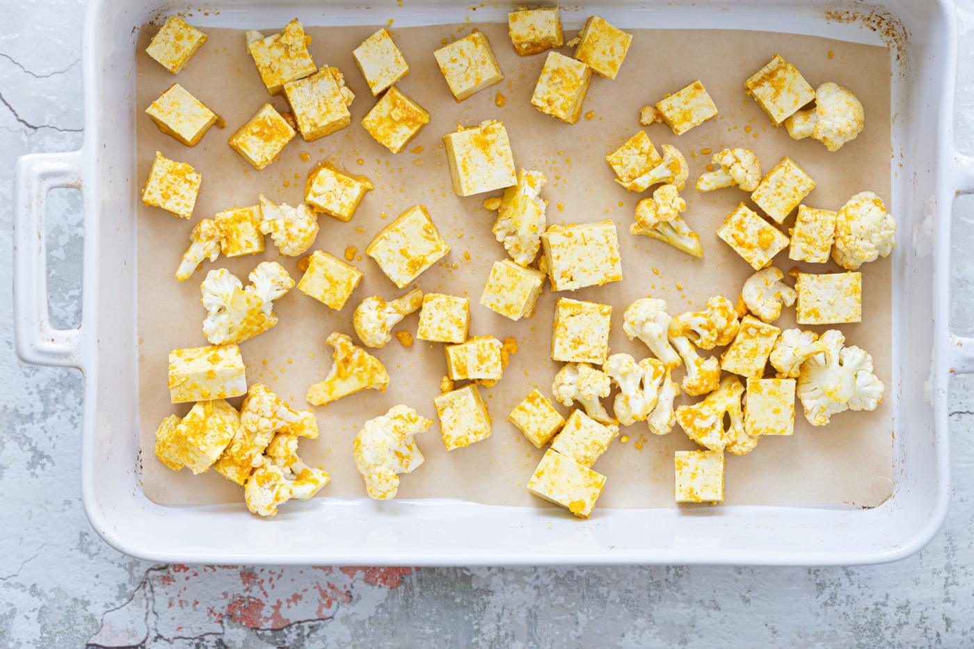 Tofu and Cauliflower in white baking dish