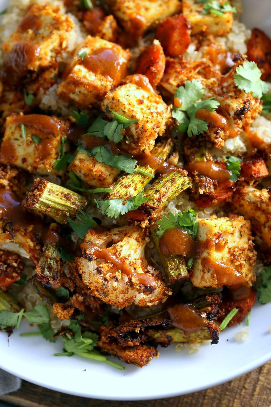 Tofu and Veggie BBQ Bowl. Veggies and Tofu tossed in from scratch barbecue seasoning and baked. Serve over quinoa dressed with bbq sauce. #Vegan #Glutenfree #Nutfree #Recipe #veganricha