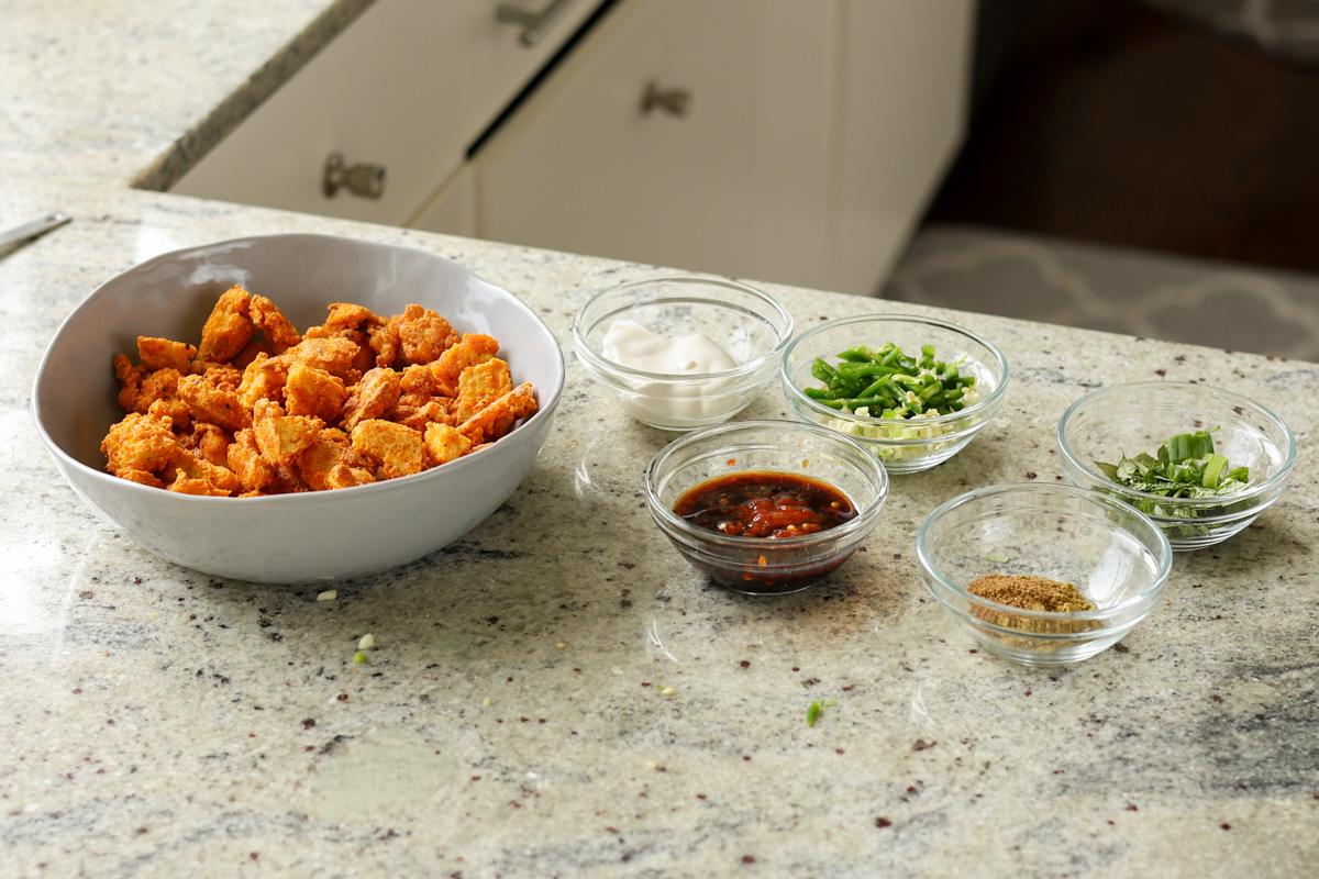 tofu majestic on the counter next to the sauce ingredients