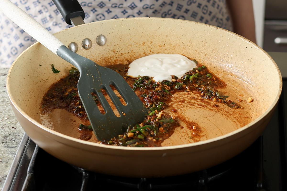 adding non-dairy yogurt to the pan