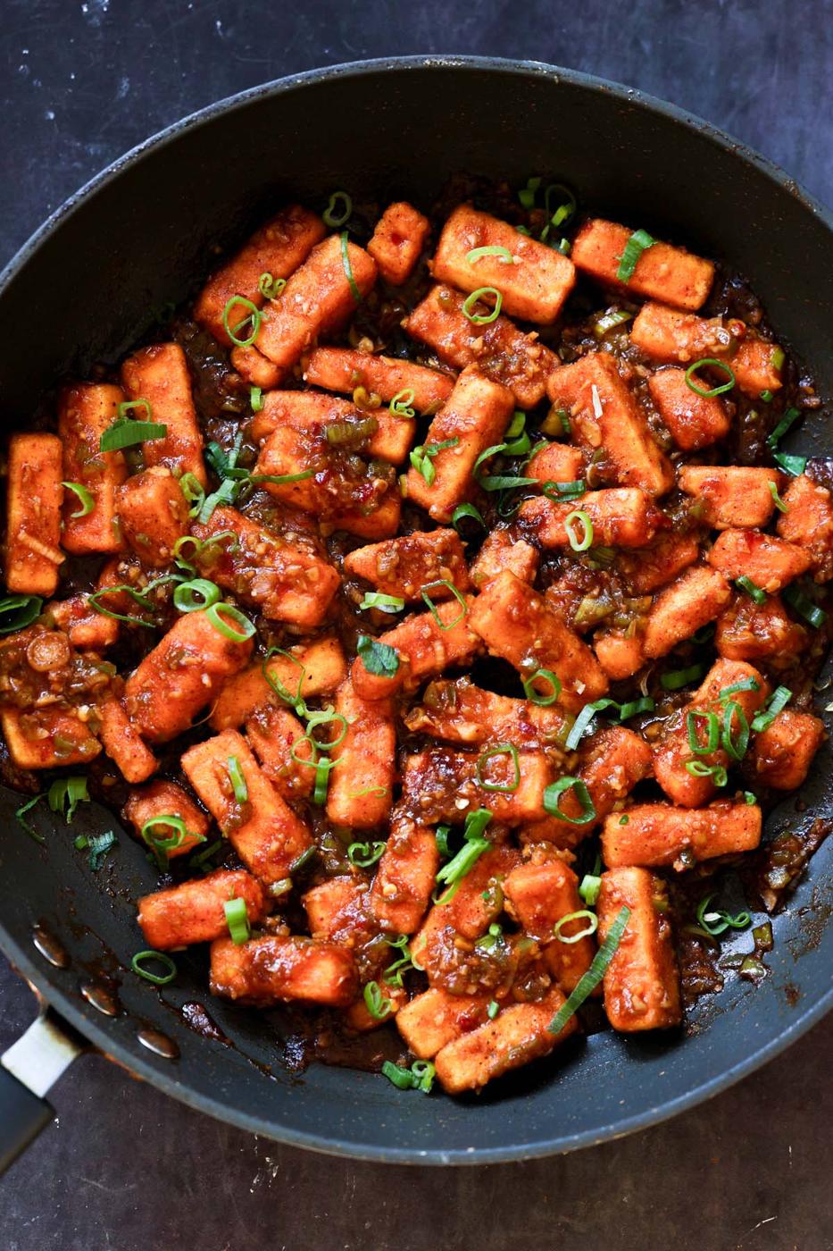tofu Manchurian in the pan after coating the tofu in the sauce