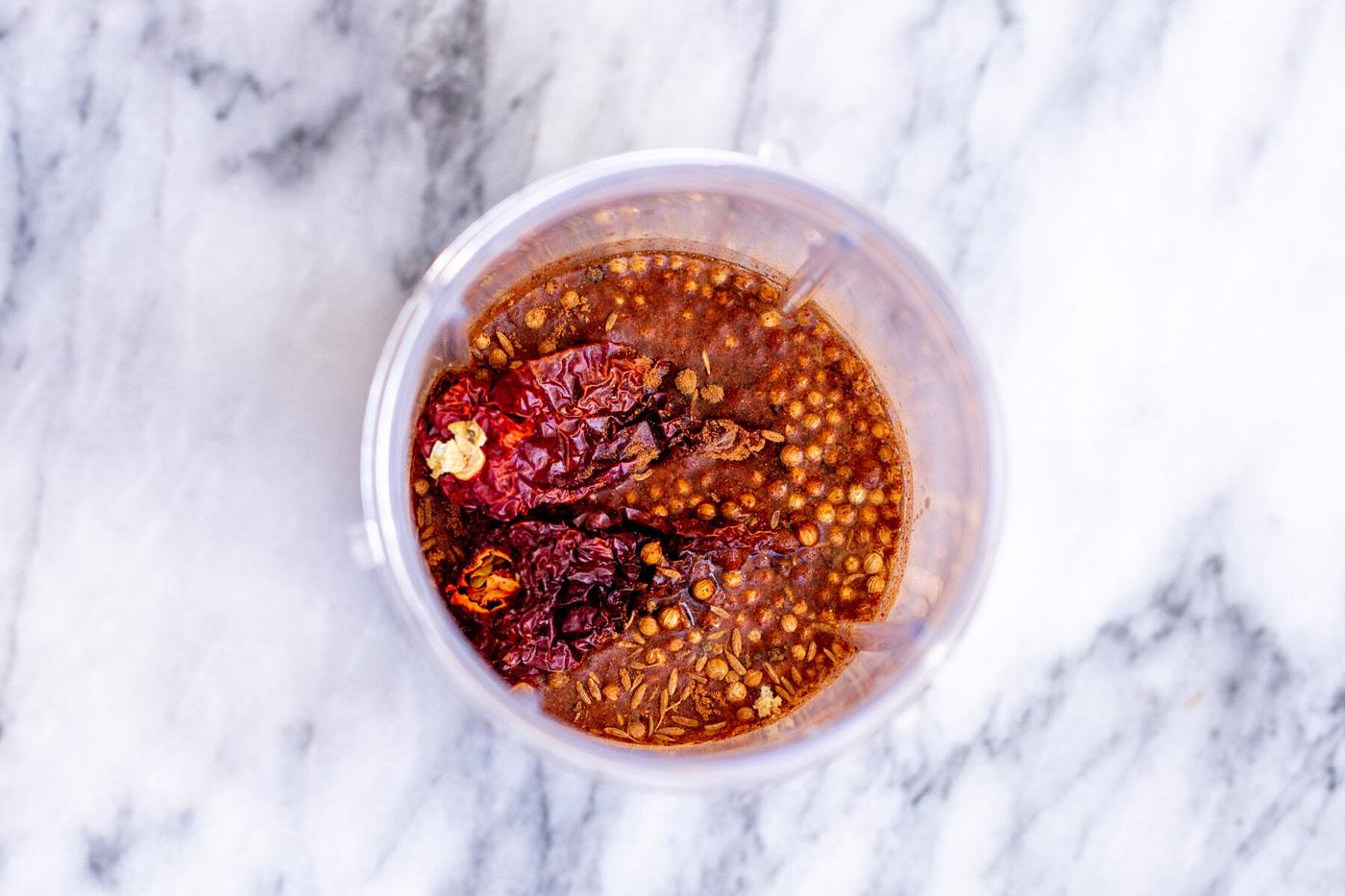 ingredients for vindaloo chili paste in a small container