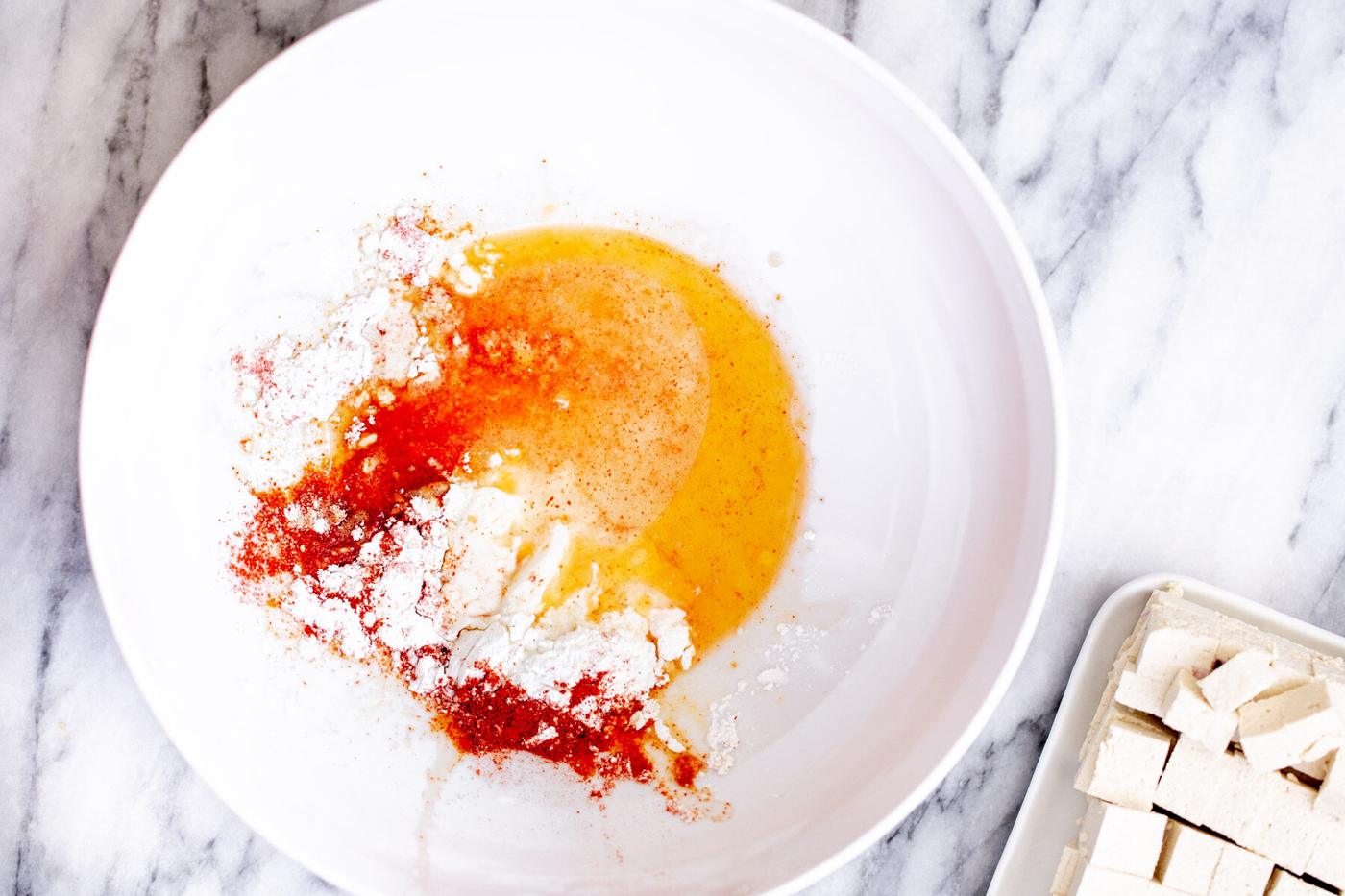 cornstarch and spices on a white plate