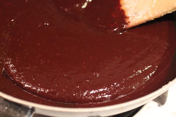 vegan triple chocolate brownie batter in a sauce pan