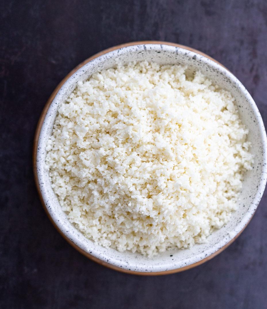 Lemony Turmeric Cauliflower Rice. Easy Side with any meal. 1 Pot Lemon Cauliflower Rice with mustard seeds and garlic. #Vegan #Glutenfree #Grainfree #Nutfree #Recipe #Turmeric #cauliflowerrice #veganrucha