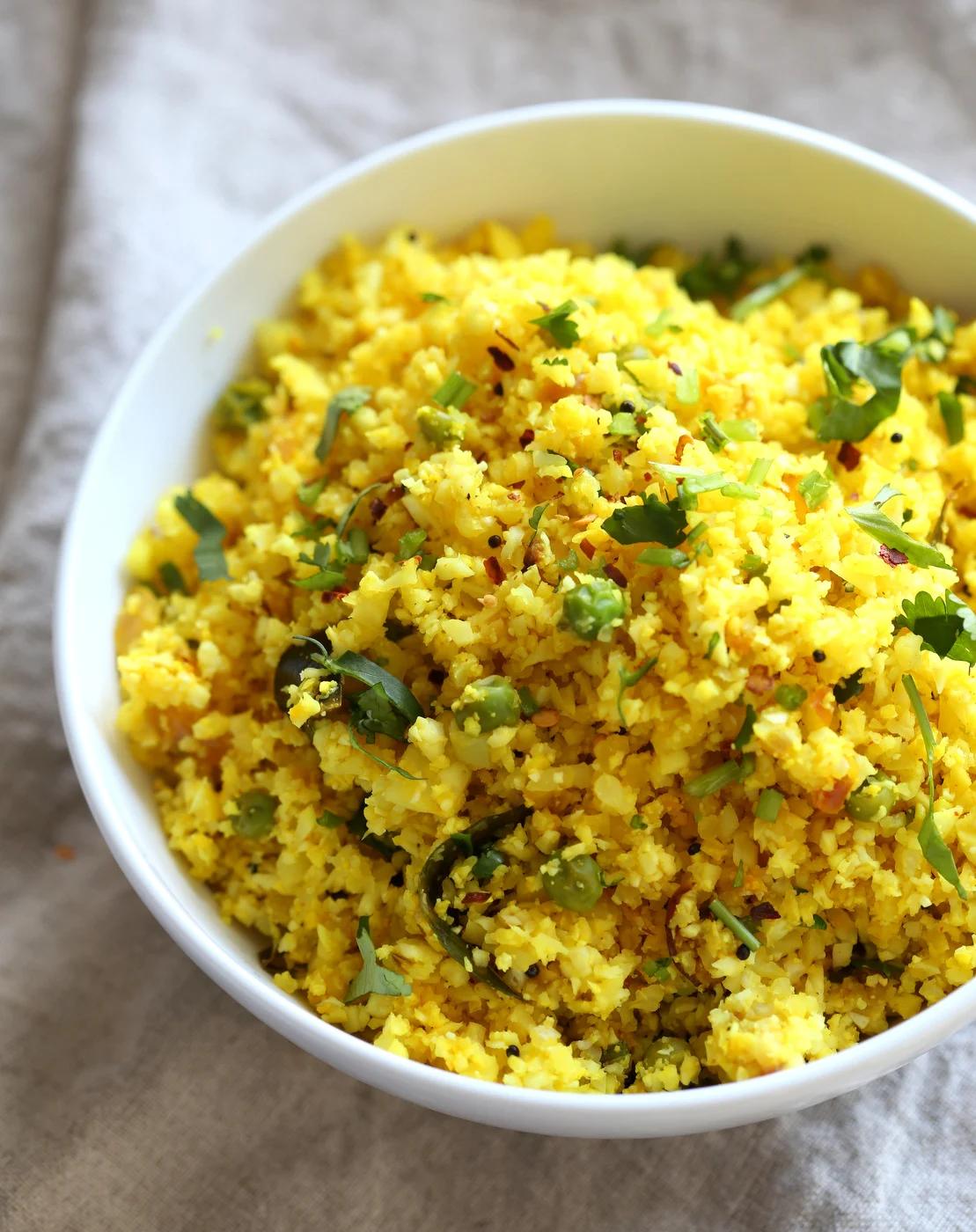 Vegan Turmeric Cauliflower Rice in a white bowl