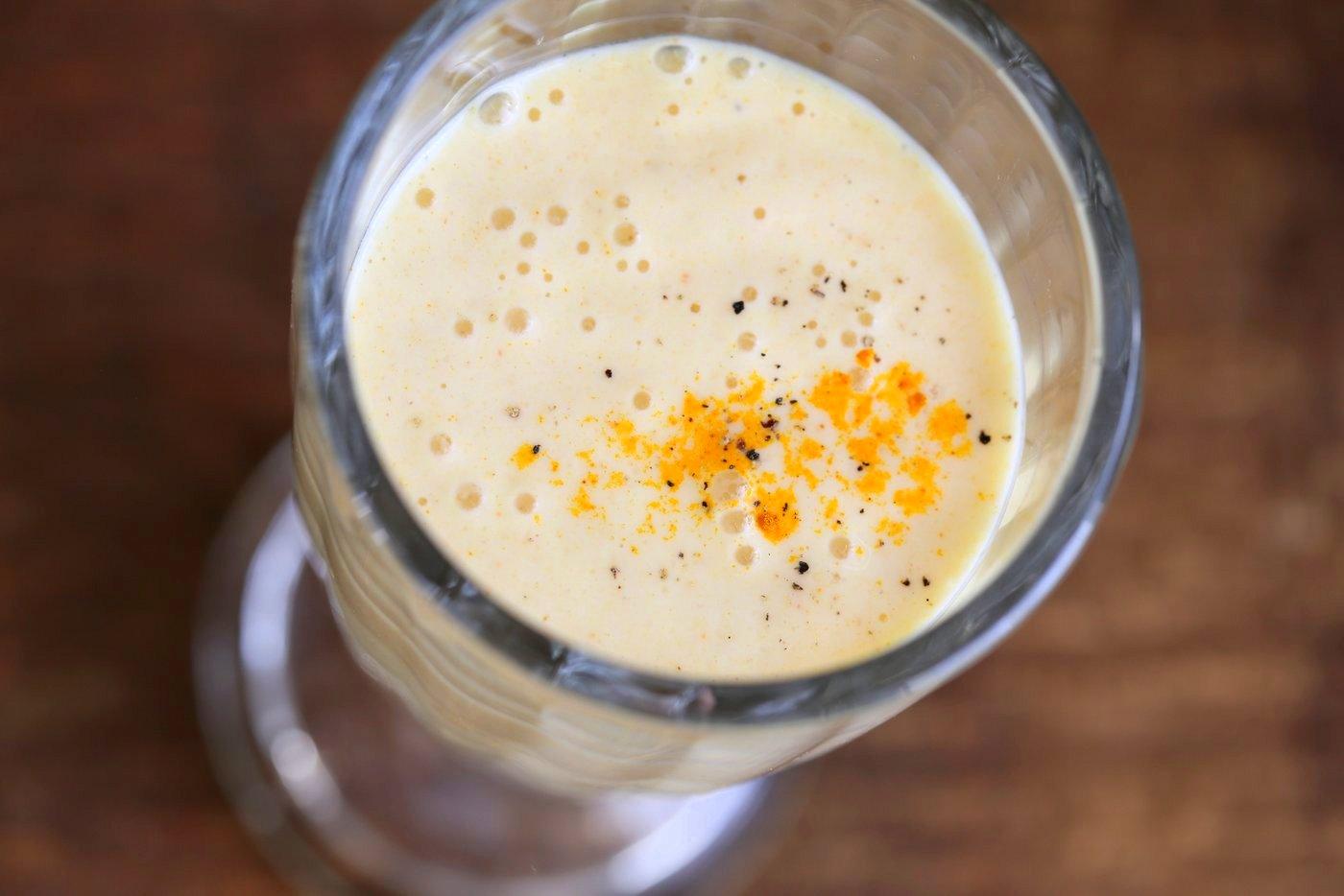 Turmeric Lassi - Golden Yogurt Drink. Lassi is a yogurt based drink served as a beverage in India. This version uses turmeric, black pepper and ginger for a cooling Lassi. Vegan Gluten-free Recipe | VeganRicha.com