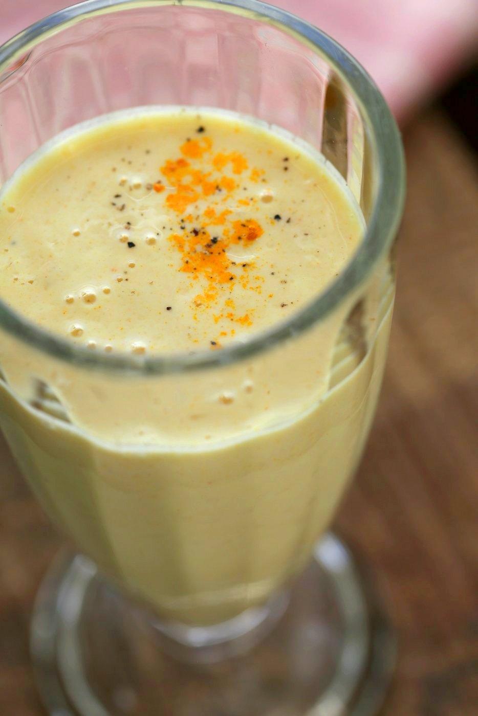 Turmeric Lassi - Golden Yogurt Drink. Lassi is a yogurt based drink served as a beverage in India. This version uses turmeric, black pepper and ginger for a cooling Lassi. Vegan Gluten-free Recipe | VeganRicha.com