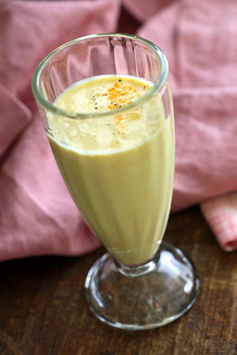 Turmeric Lassi - Golden Yogurt Drink. Lassi is a yogurt based drink served as a beverage in India. This version uses turmeric, black pepper and ginger for a cooling Lassi. Vegan Gluten-free Recipe | VeganRicha.com