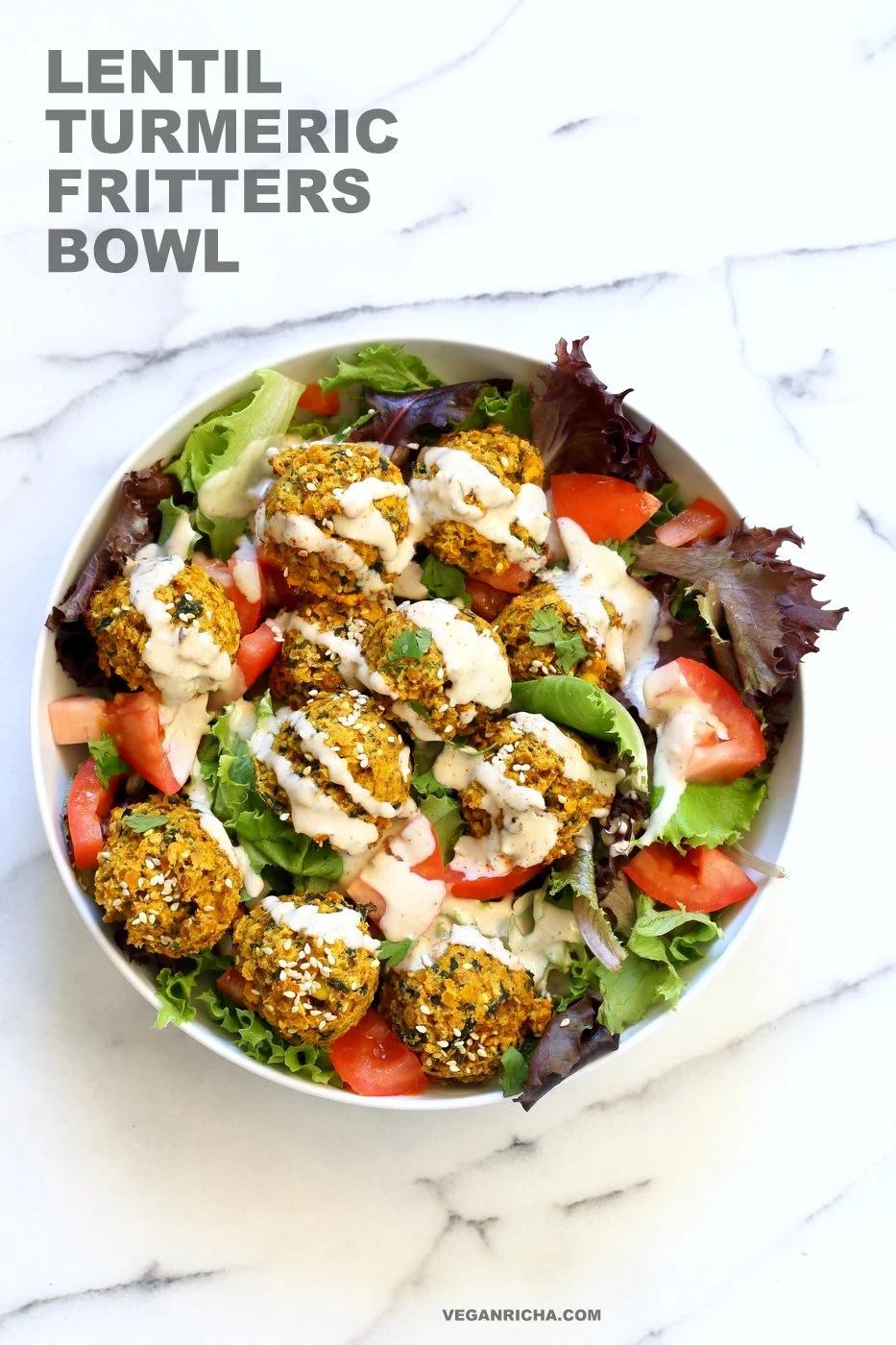 Turmeric Lentil Fritters Tomato Greens Bowl with Tahini Dill Sauce. Baked Seedy Golden Lentil fritters with greens, tomatoes and a tahini sauce make an easy Lunch bowl. #Vegan #Nutfree #Soyfree #Recipe. Easily #Glutenfree #veganricha | VeganRicha.com