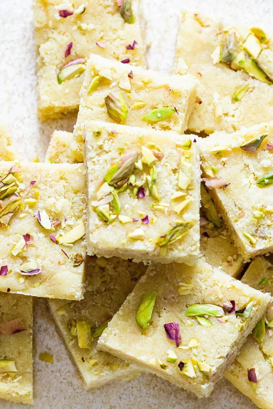 almond burfi topped with chopped nuts