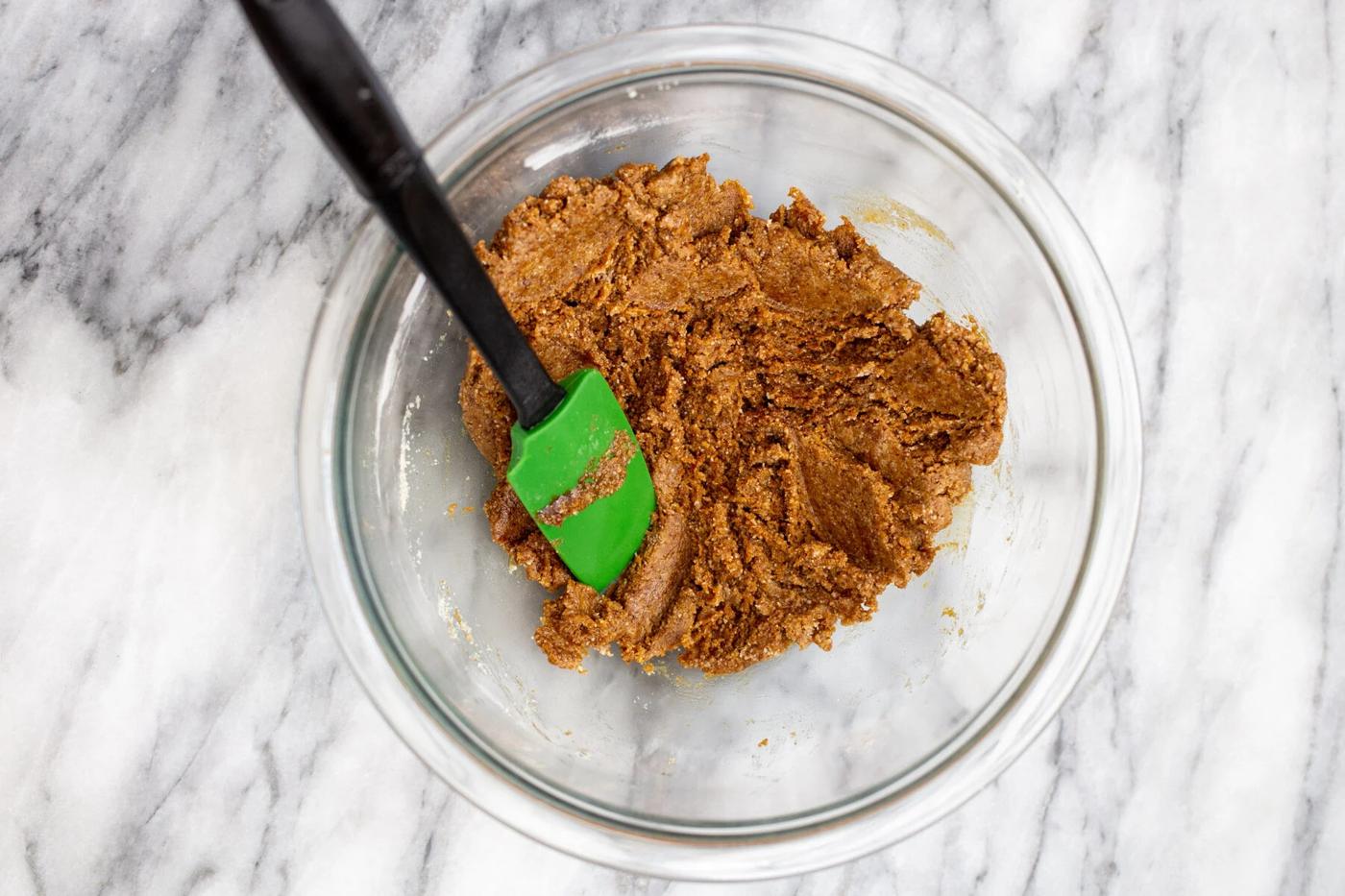 ginger almond flour cookie dough in a glass bowl