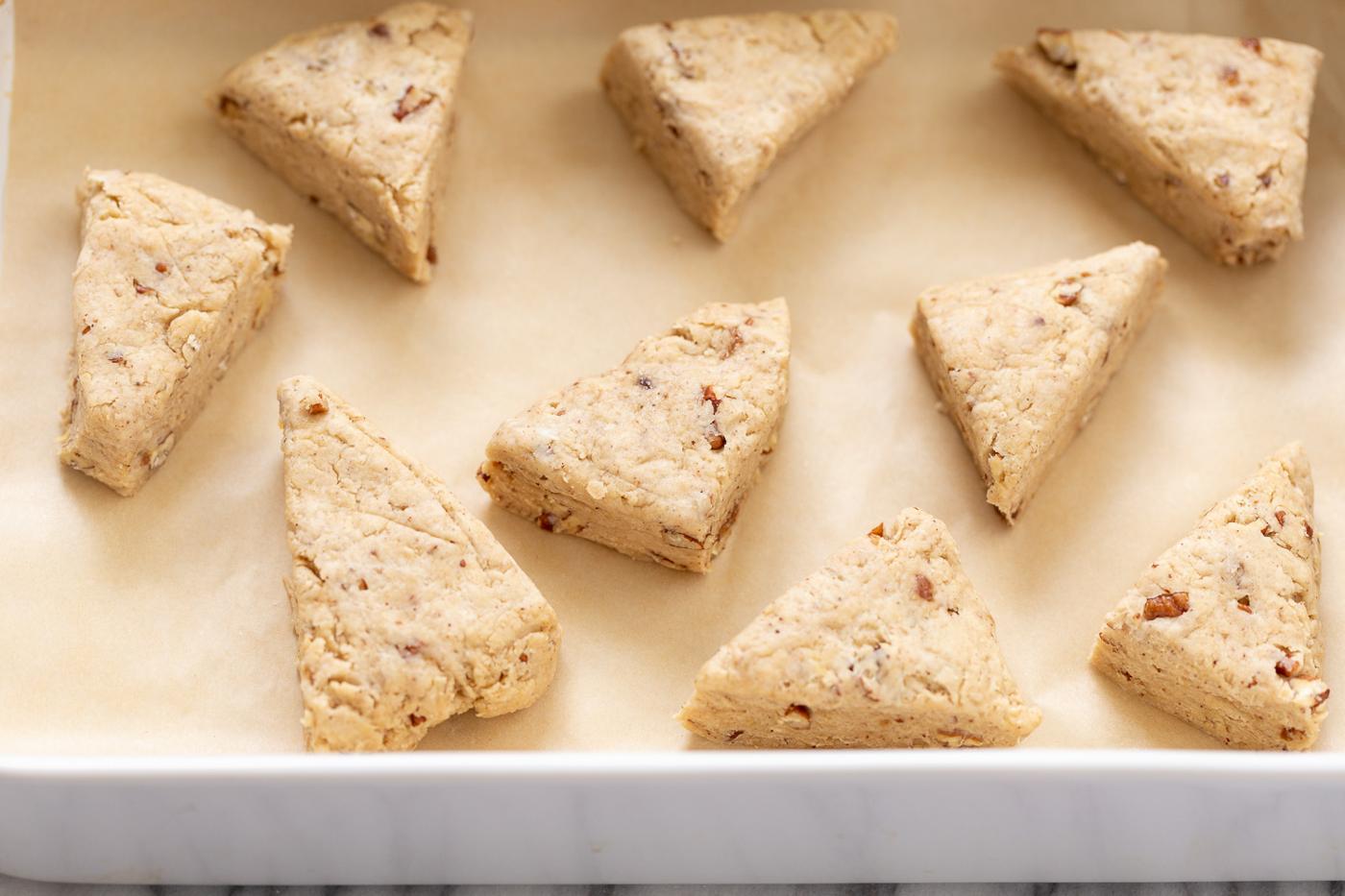 vegan banana scones on a cookie sheet lined with parchment paper