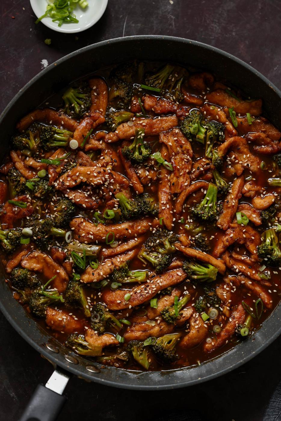 vegan beef with broccoli in the pan after adding garnishes