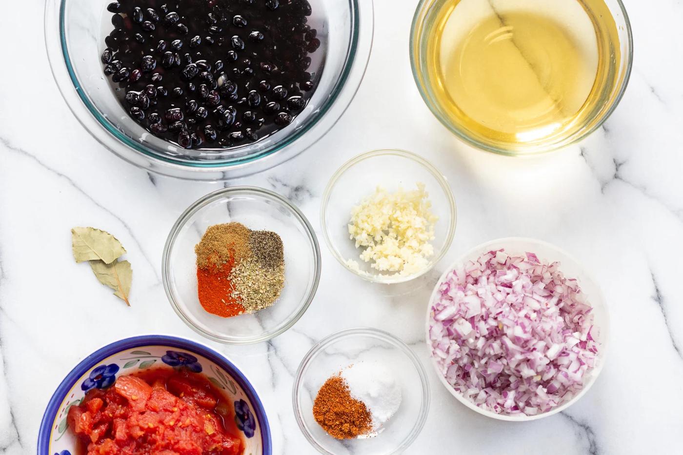 overhead shot of all ingredients needed for making vegan black bean soup in an Instant Pot