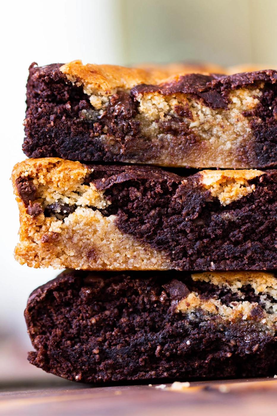 close-up of a stack of vegan brookie slices, so you can see the pretty, swirled inside