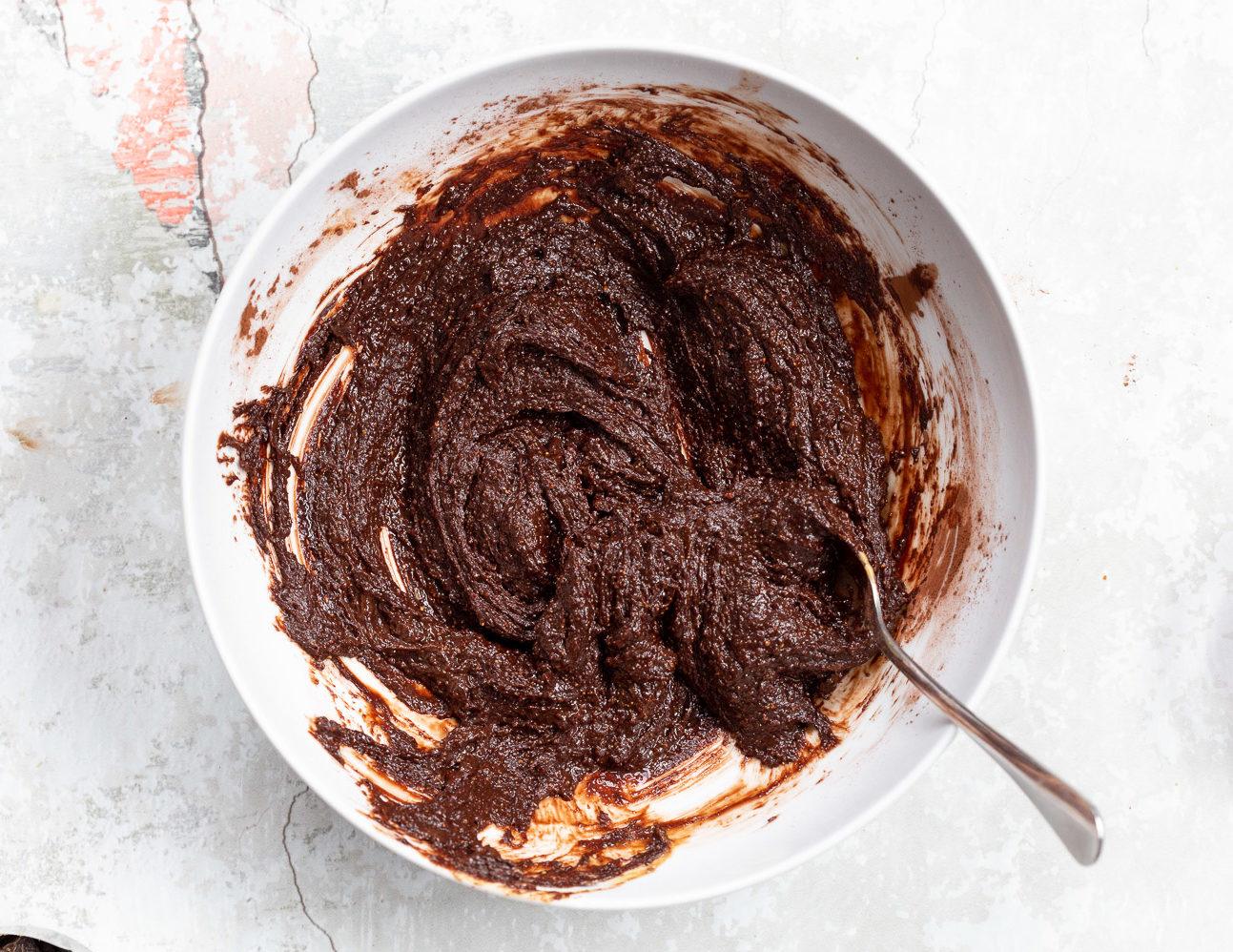 Batter for Vegan Brownie Cookies in a white bowl