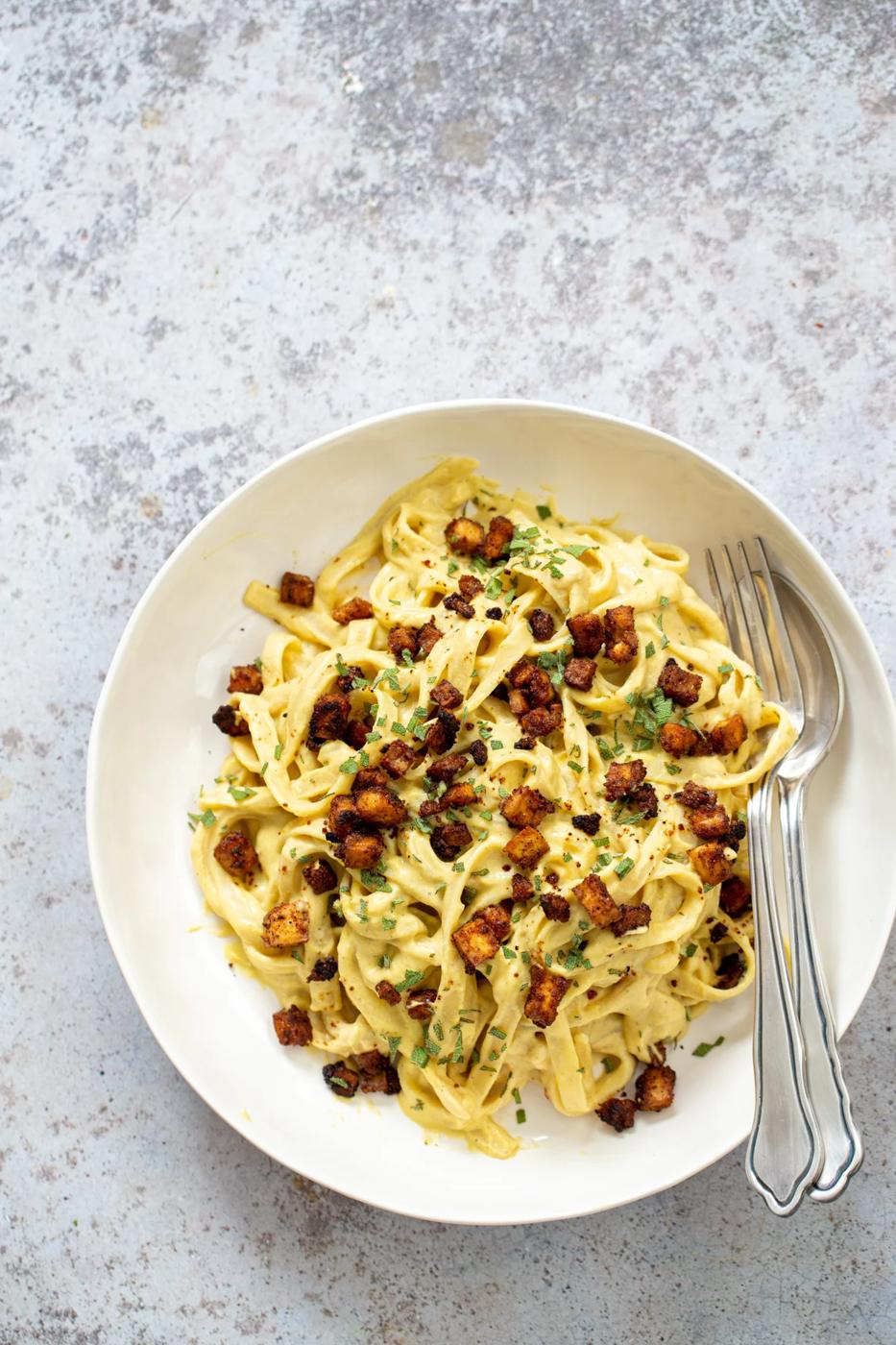 overhead shot of a vegan Butternut Squash Carbonara Pasta served with roasted tofu